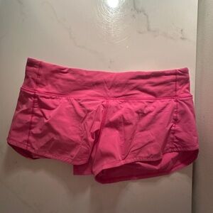 Lululemon sonic pink speed up shorts size 6 
2.5 length